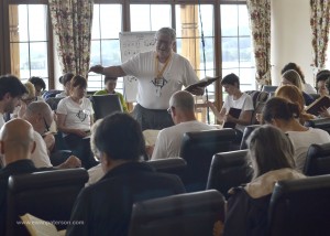 Sacred Harp composer P. Dan Brittain leads a song during a class at Europe Camp, 2012.