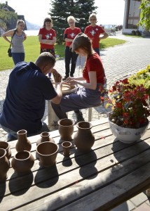 Learning the art of Kashubian pottery at Europe Camp, 2012.